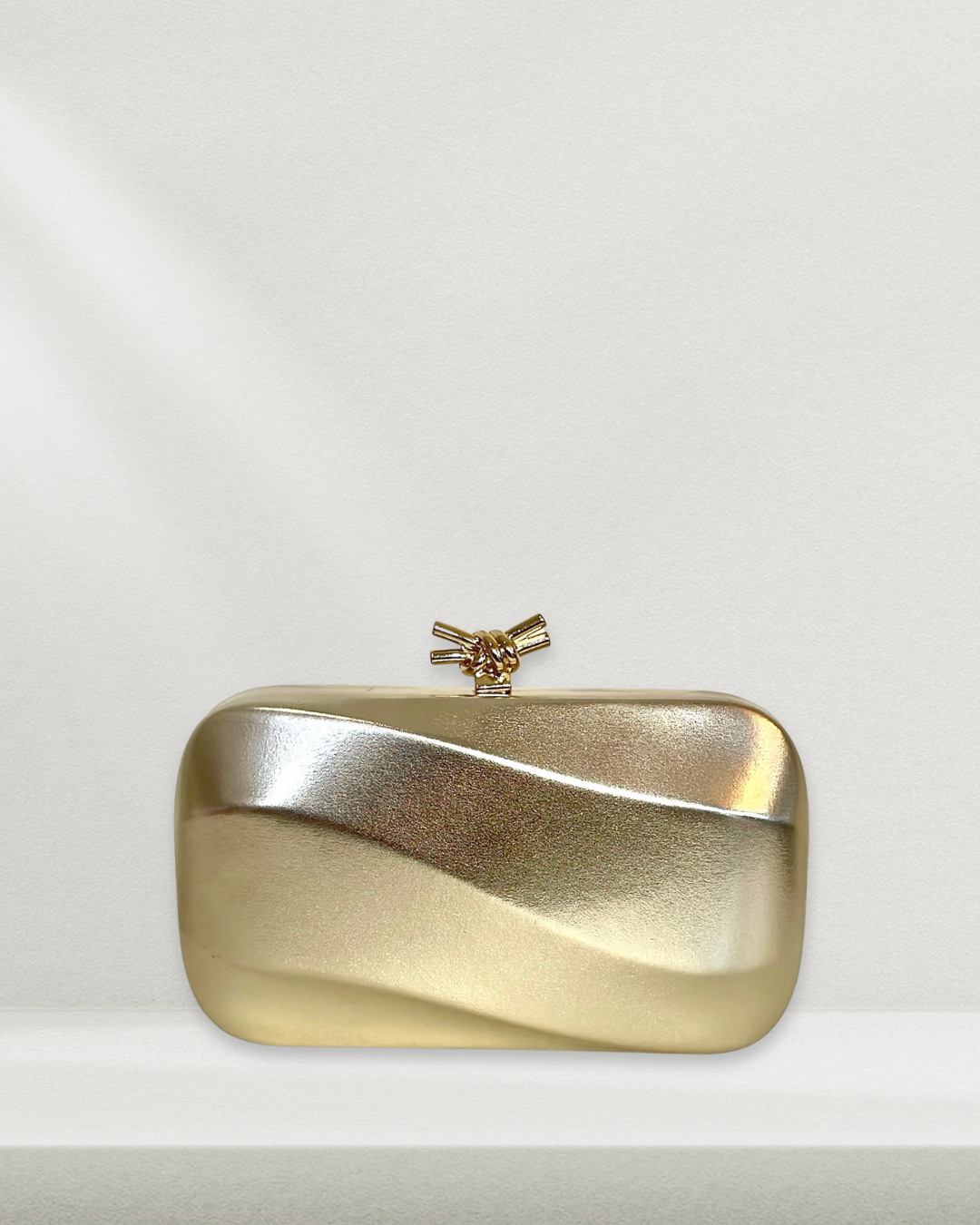 Pippa Gold Knot Clutch