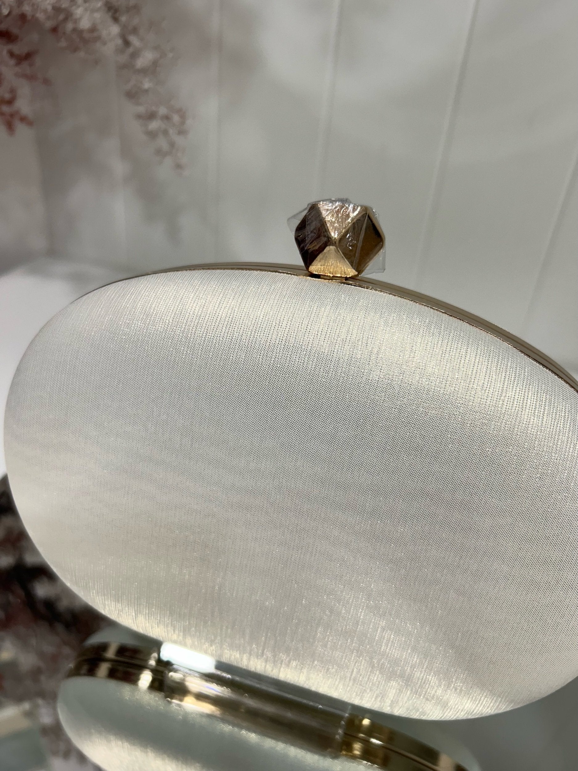 Nina Cream Oval Clutch